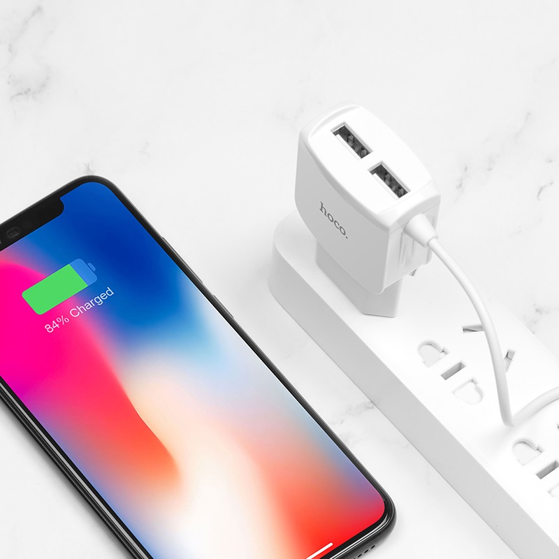 HOCO C59 & C59A Mega joy зарядный адаптер с двумя USB и встроенным кабелем для APPLE Lightning 8-pin, цвет белый.